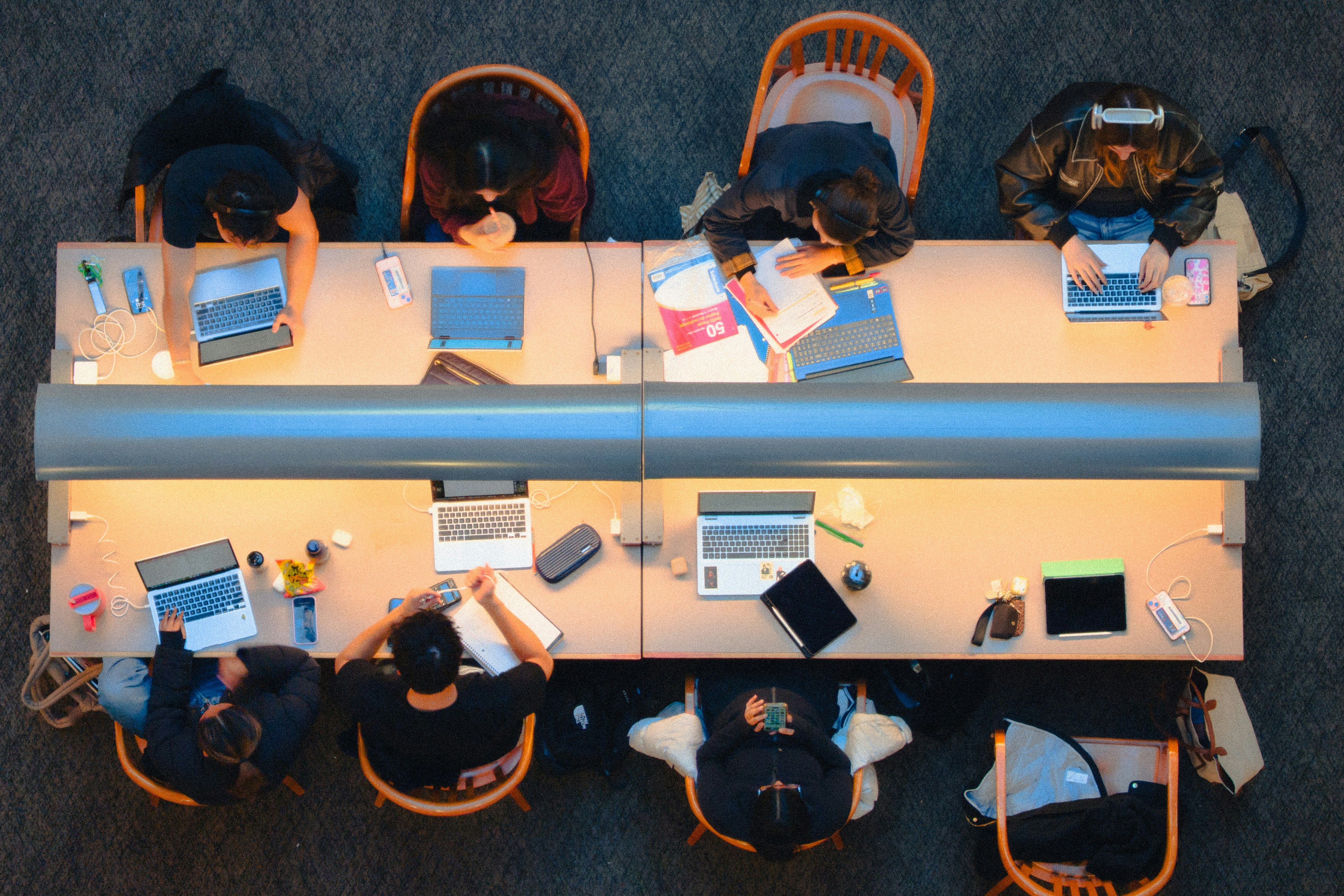 Team collaborating around a shared workspace